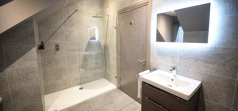 Our Luxury Guest House Accommodation in Portrer contains spacious modern en suite bathrooms