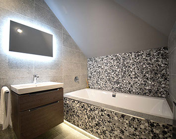 Taransay House in Portree contains modern bath shower rooms with electric mirrors