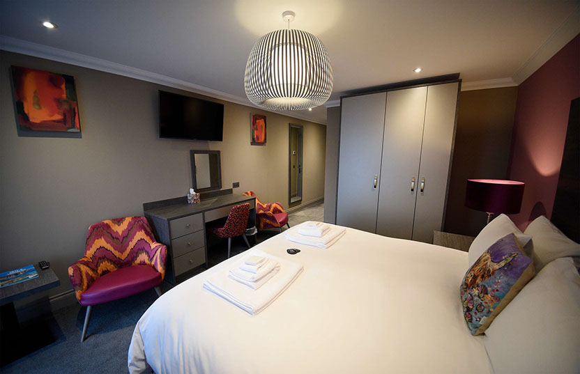 Stay in total comfort with Smart TVs WIFI internet en suite luxury rooms at Taransay House in Portree
